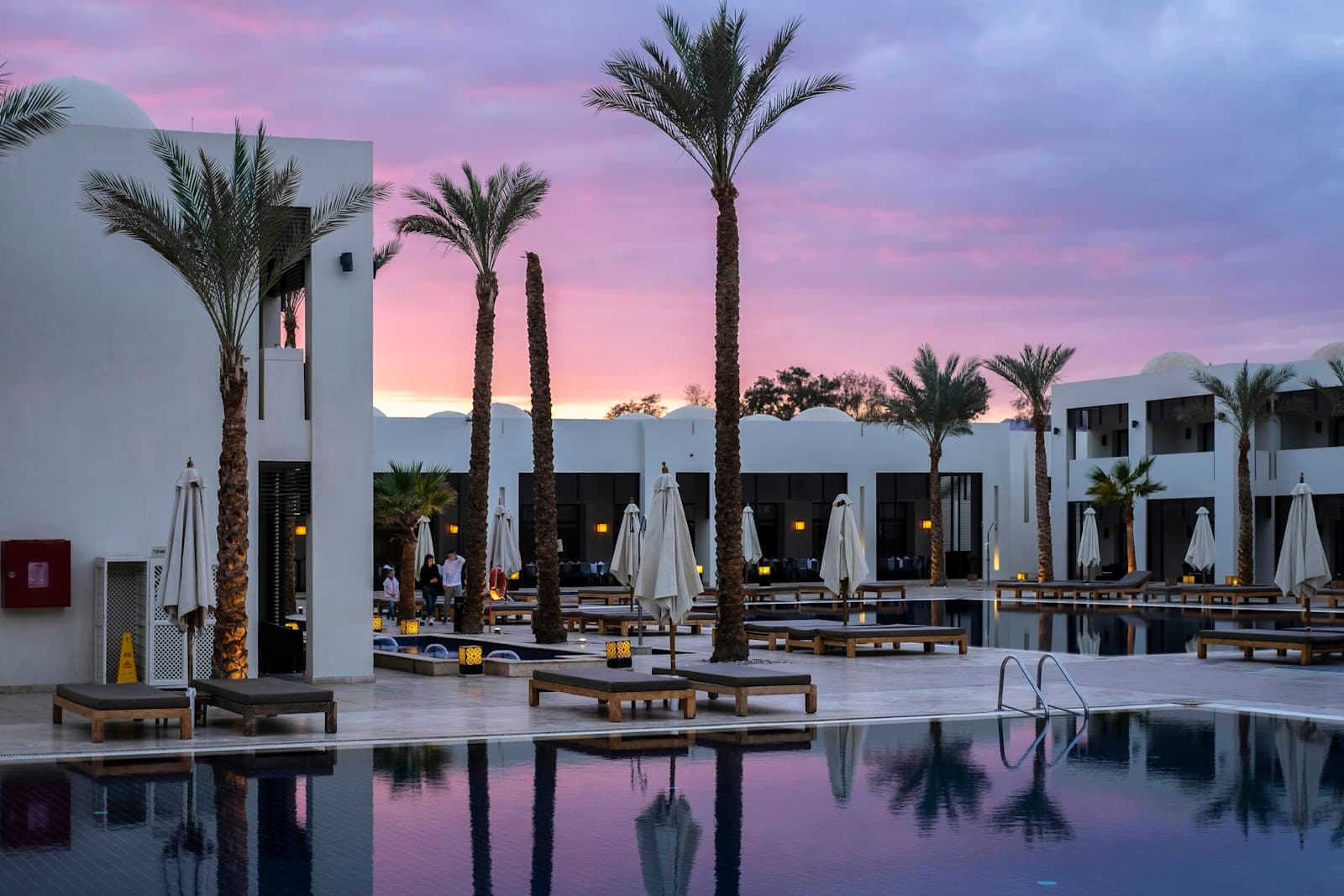 Contemporary hotel exterior at dusk